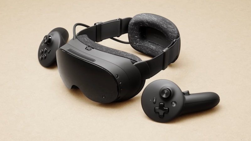 The Steam Frame headset's fabric head strap, shown alongside its tracked controllers. Image: Valve.